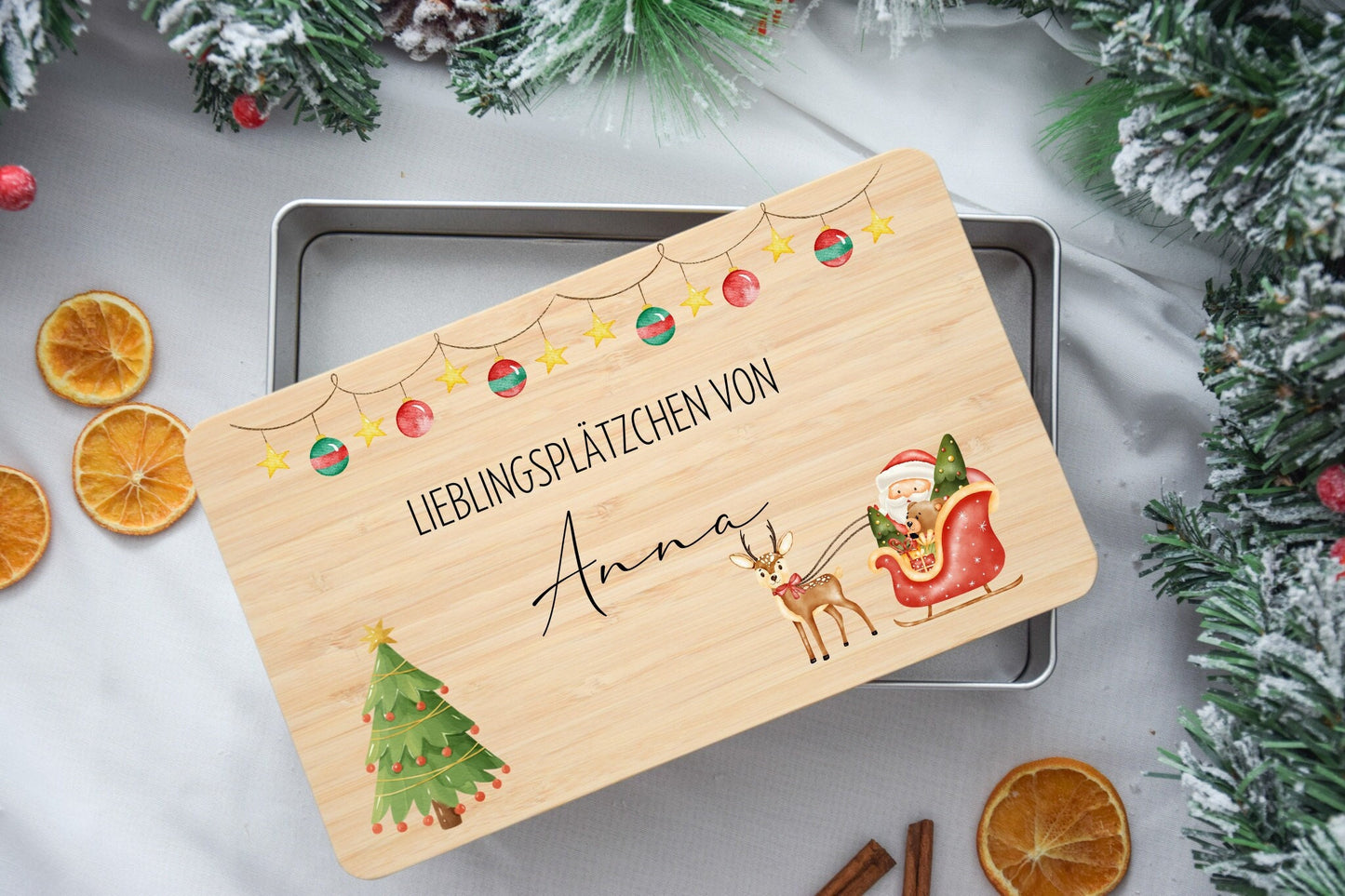 Koekjesblikken voor kerstkoekjes met kerstmanmotief en slee