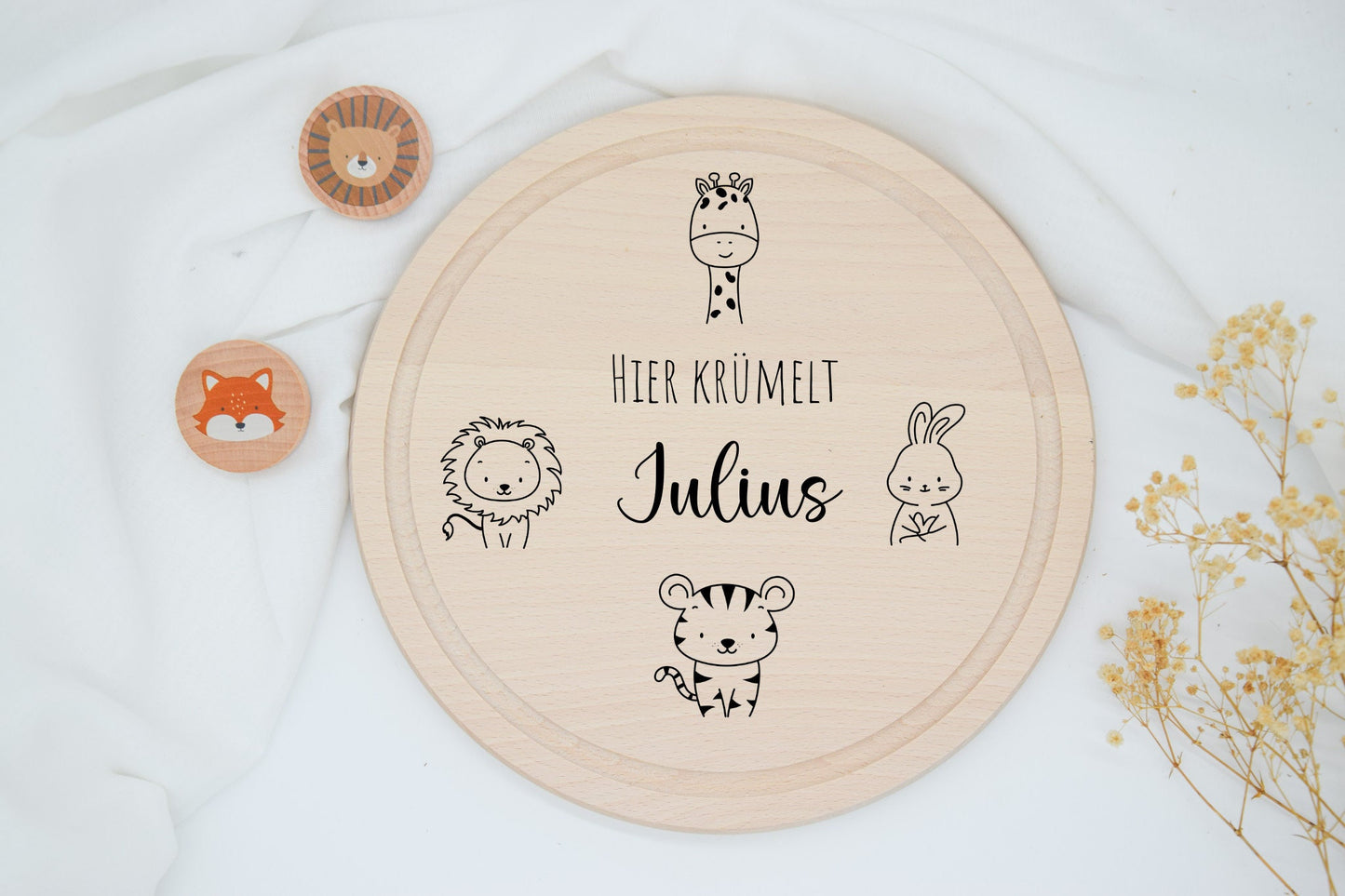 Ronde ontbijtplank met vier speelse dierenmotieven
